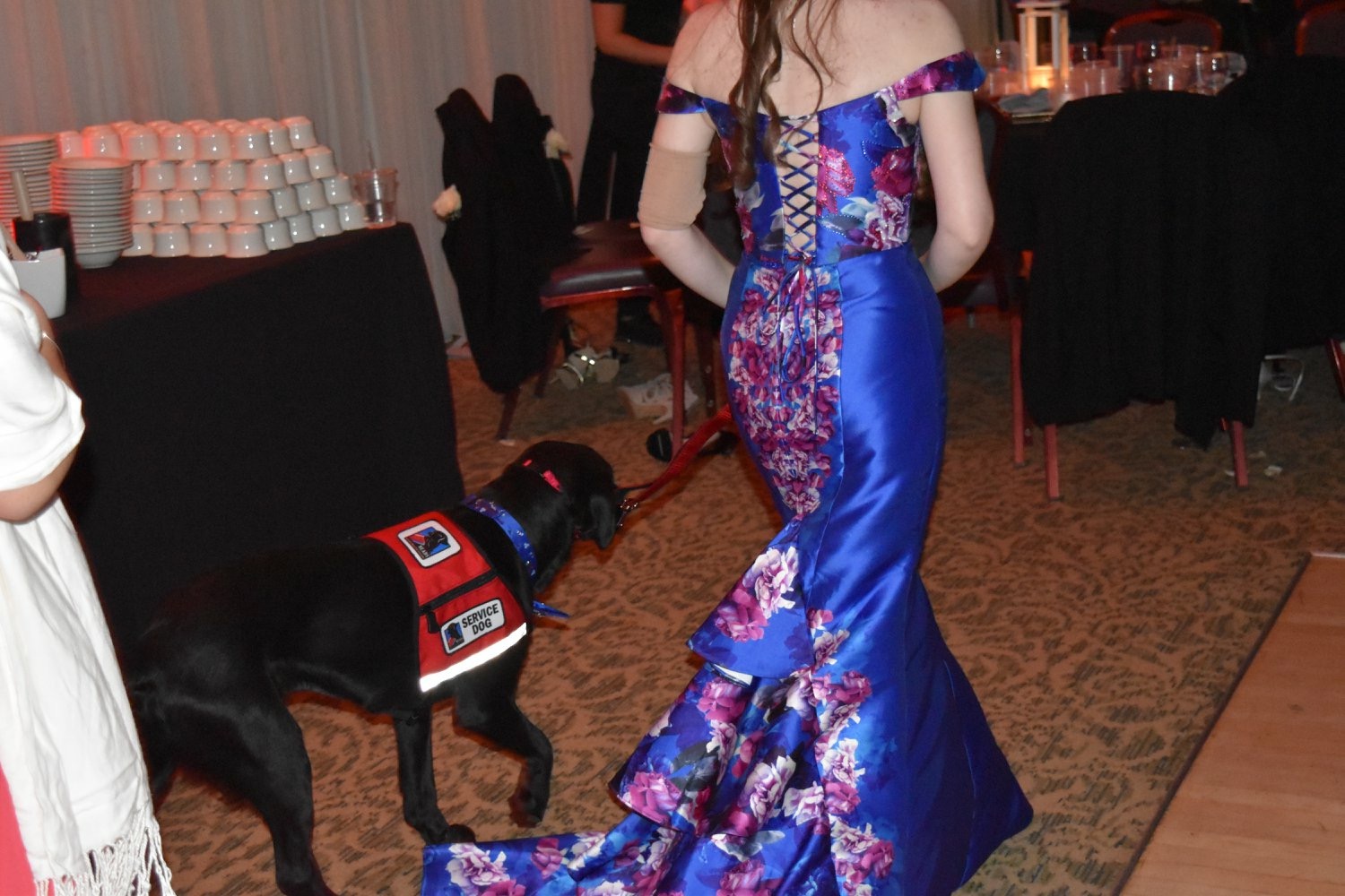 A picture of Barrett and his partner at her junior prom with Barrett's bowtie matching her dress